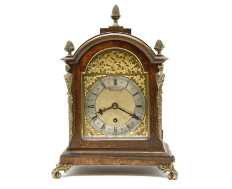 An early 20th century oak cased mantel clock, with single fusee movement, inscribed 'Webster, Queen Victoria St, London', 36c