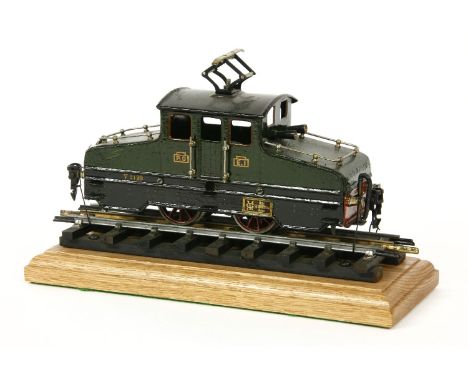 A Marklin overhead electric 0.4.0 locomotive, no. 3120  23cm long, on a track section