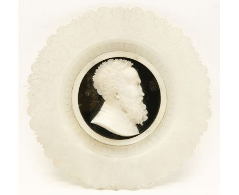A Grand Tour style wall plaque, the alabaster body with chased floral decoration bordering the central eartouche of a portrai