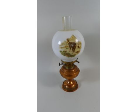 A Copper Oil Lamp with Opaque Glass Shade Decorated with Mountain Goats, 46cm high 