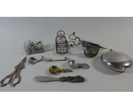 A Tray of Silver Plated Sundries to Include Hip Flask Candle Snuffers, Grape Scissors, Tea Caddy Spoons, Toast Rack Etc