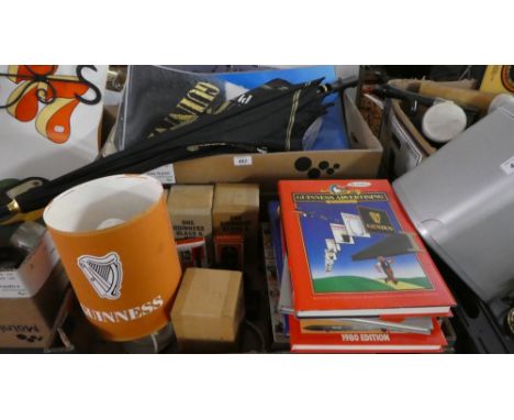 Two Boxes of Guinness Ephemera to Include Ten Guinness Book of Records, Table Lamp, Glassware, Playing Cards, Posters, Calend