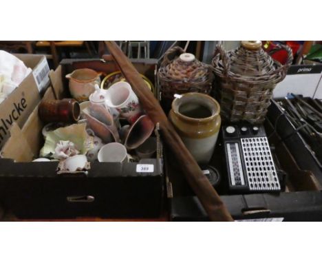 Two Boxes Containing Ceramics to Include Teawares, Stoneware Jars, Radio, Bench Vice and Fishing Rod