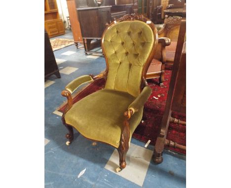 A Victorian Balloon Back Ladies Armchair with Button Green Velvet Upholstery and Carved Detail