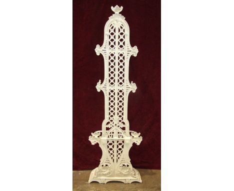A Victorian white-painted cast iron hall stand, the back with lattice decoration above a double stick stand and drip tray, re