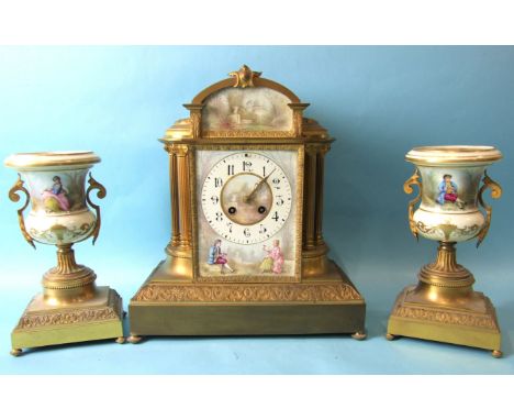 A French gilt metal and ceramic clock garniture, the painted enamel dial depicting two lovers and with Arabic numerals, 34cm 