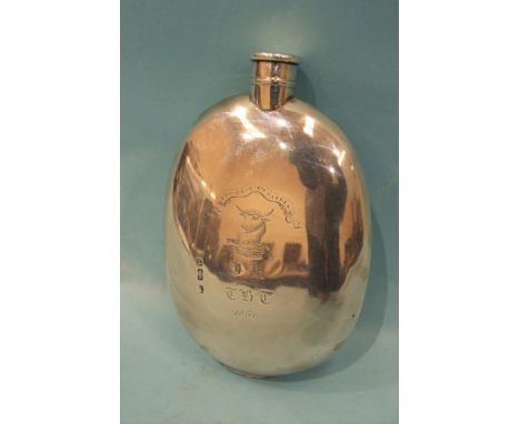 A Victorian silver spirit flask of plain flattened form, with separate screw top, engraved with a crest and inscription dated