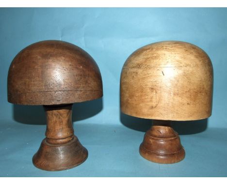A vintage milliner's wooden hat block stand on turned base, incised V127 23, block 20 x 17cm, 12.5cm high, 27cm high overall 