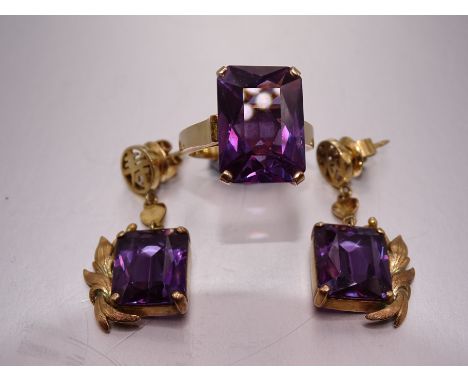 A 14k gold ring set rectangular-cut synthetic sapphire, size M and a pair of synthetic sapphire-set earrings, 15.3g. 