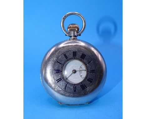 A Swiss silver half-hunter-cased keyless pocket watch, the white enamel dial with Roman numerals and seconds subsidiary, with