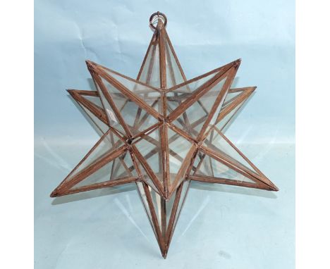 A Moroccan-style glazed star lantern, 40cm diameter, a gold glass 'witch ball', 36cm diameter and a bead-filled glass witch s