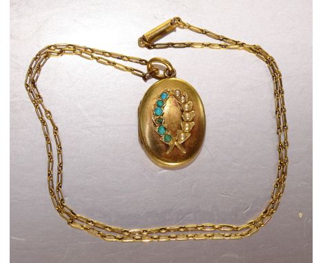A small oval gold locket with laurel wreath set turquoise and pearls, on chain, (tests as 18ct approximately), 6.4g gross wei