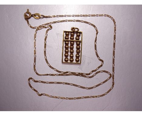 A 14k gold abacus pendant on 14k gold neck chain, 48cm long, 4.3g. 