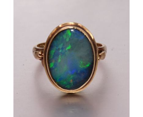 A 14ct gold ring set black opal, size N, 5.3g. 