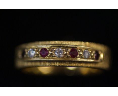 18ct Gold ring set with 3 diamonds &amp; 4 rubies Size K