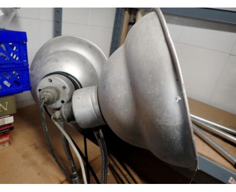 Two aluminum, floor standing spot light. Not available for in-house P&amp;P 