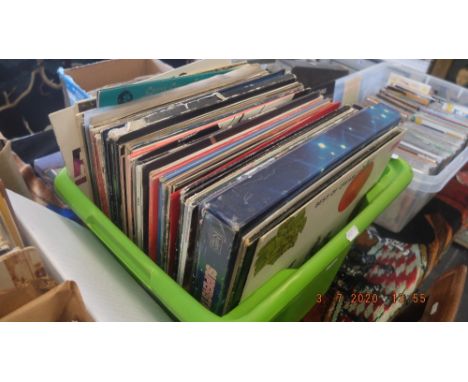 A collection of vinyl Lp's and singles, including David Bowie, Rolling stones etc.