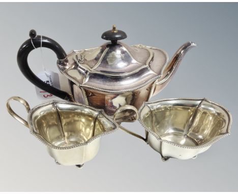 A Sheffield silver plated three-piece tea service, comprising the teapot, sugar bowl and cream jug.  (3) 