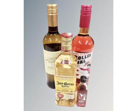 A bottle of Jose Cuervo tequila 50cl together with a rasberry vodka miniature and two bottles of wine 