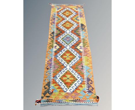 A Chobi kilim runner 180cm by 60cm