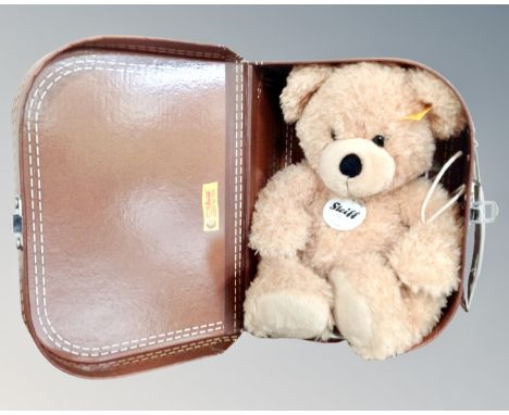 A Steiff Fynn bear in miniature suitcase 