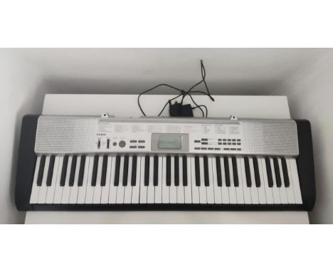 Casio LK 130 - Keylighting keyboard with digital screen, 50 preset rhythm pieces and 100 tone presets, with mains charger, al