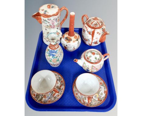 Nine pieces of antique and later Japanese ceramics including Kutani vase, eggshell tea ware, teapot and water jug.