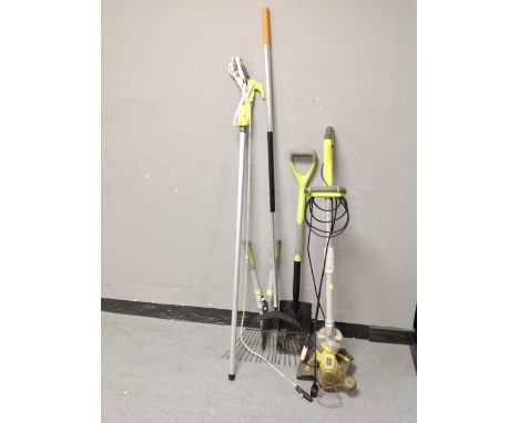 A Ryobi Easi-edge electric strimmer together with a small bundle of garden tools 