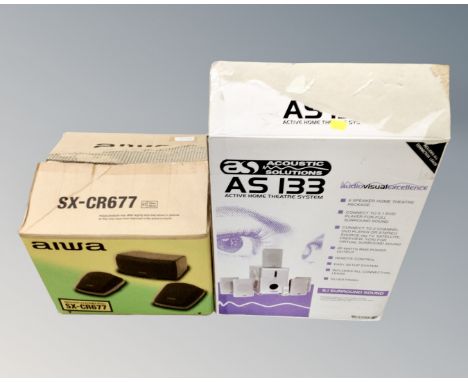 An Acoustic Solutions AS 133 home theatre system together with a three piece Iowa speaker set, both parts boxed.