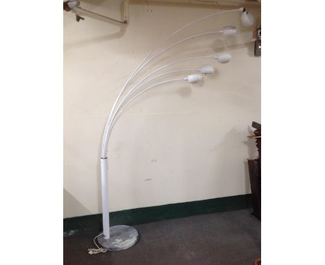 A contemporary floor lamp with adjustable lights on grey and white marble base 