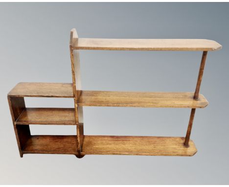 A set of 20th century oak open step shelves 