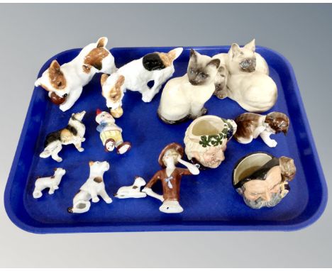 A tray containing ceramic ornaments including Royal Doulton Terriers and Persian cats, kitten, miniature character jugs, chin
