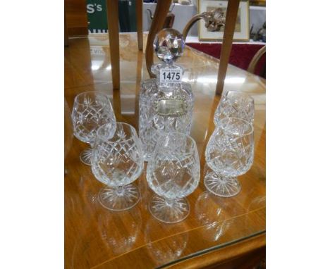 A cut glass decanter with silver whisky label and five brandy goblets, COLLECT ONLY. 