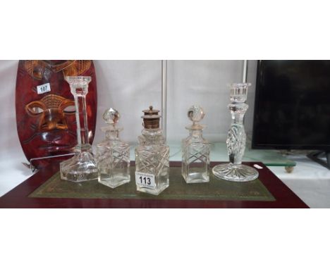 4 vintage condiment bottles and 2 candlesticks 