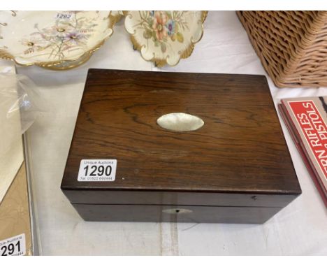 A Victorian jewellery box with mother of pearl inlaid lid