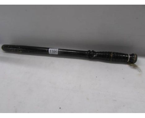 A 1950/60's U S military police wooden baton, 56 cm long. 