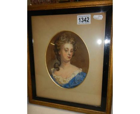 A framed and glazed portrait in watercolour. 