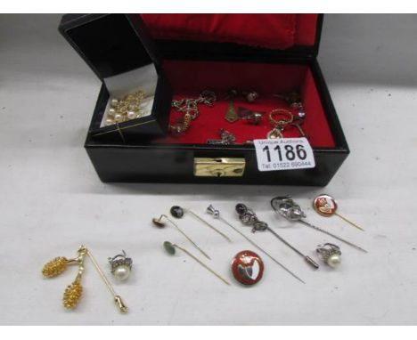 A box of costume jewellery including hat pins, silver &amp; pearl earrings etc.,