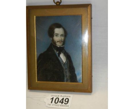 A hand painted portrait of a Victorian gentleman on ivorex. 