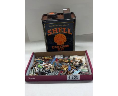 A good lot of mostly enamel transport pin badges including cars, ships, buses etc, includes a retro Shell car care kit petrol