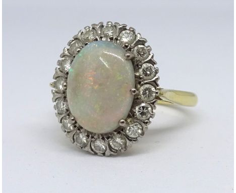 An 18ct opal and diamond cluster ring, Size P.