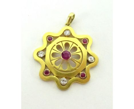 An Edwardian ruby and diamond pendant.