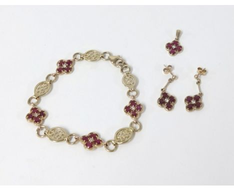 A 9ct gold suite of jewellery consisting of ruby and diamond flower cluster formation bracelet sectioned with Celtic type pat