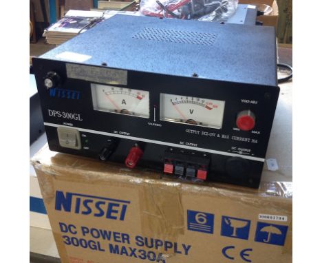 A NISSEI DPS-300GL DC POWER SUPPLY WITH KETTLE LEAD AND BOX. T2I