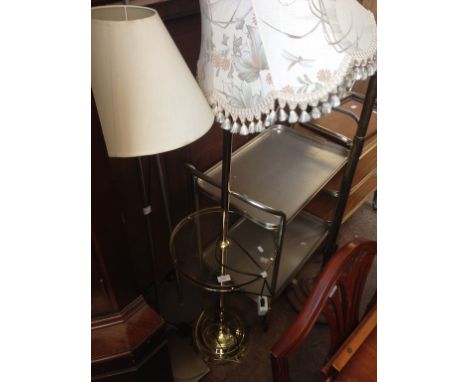 A BRASS EFFECT LAMP WITH GLASS SHELF
