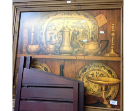 A PRINT DEPICTING A SHELF OF ANTIQUES