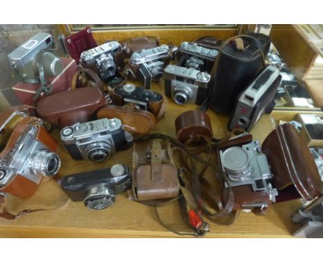 Ten vintage cameras including Zeiss, Contax, Kodak Retina and a Cine Kodak camera 