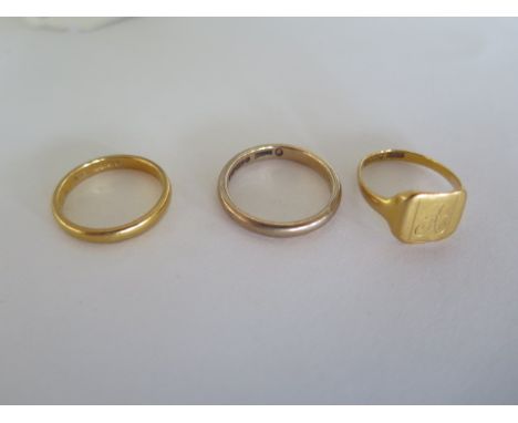 A 9ct gold band ring, approx 3 grams, and two 22ct gold rings, approx 6 grams 