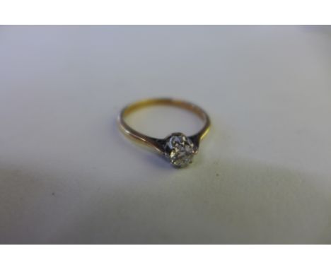 An 18ct gold solitaire ring, size K, approx 1.9 grams, approx 0.21ct, diamond bright, some usage marks/wear 