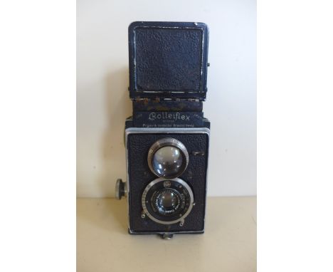 A Rolleiflex twin lens camera, number 030930 